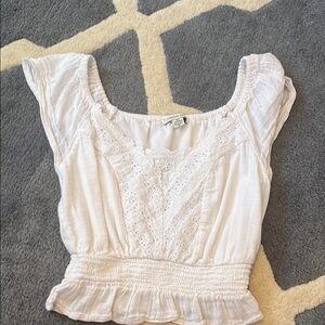 American Eagle Outfitters Cream Smocked Ruffled Blouse